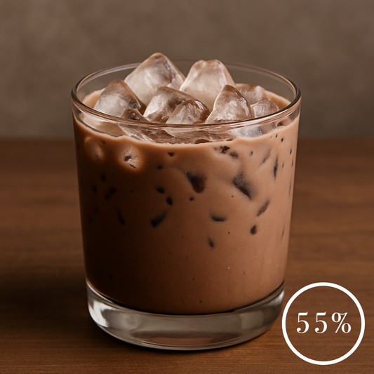 Glass of 55% iced organic hot chocolate drink with ice cubes on a wooden surface