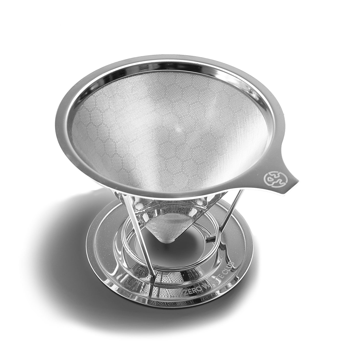 A stainless steel pour-over reusable filter with a wide mouth and handle designed for brewed cacao drinks.