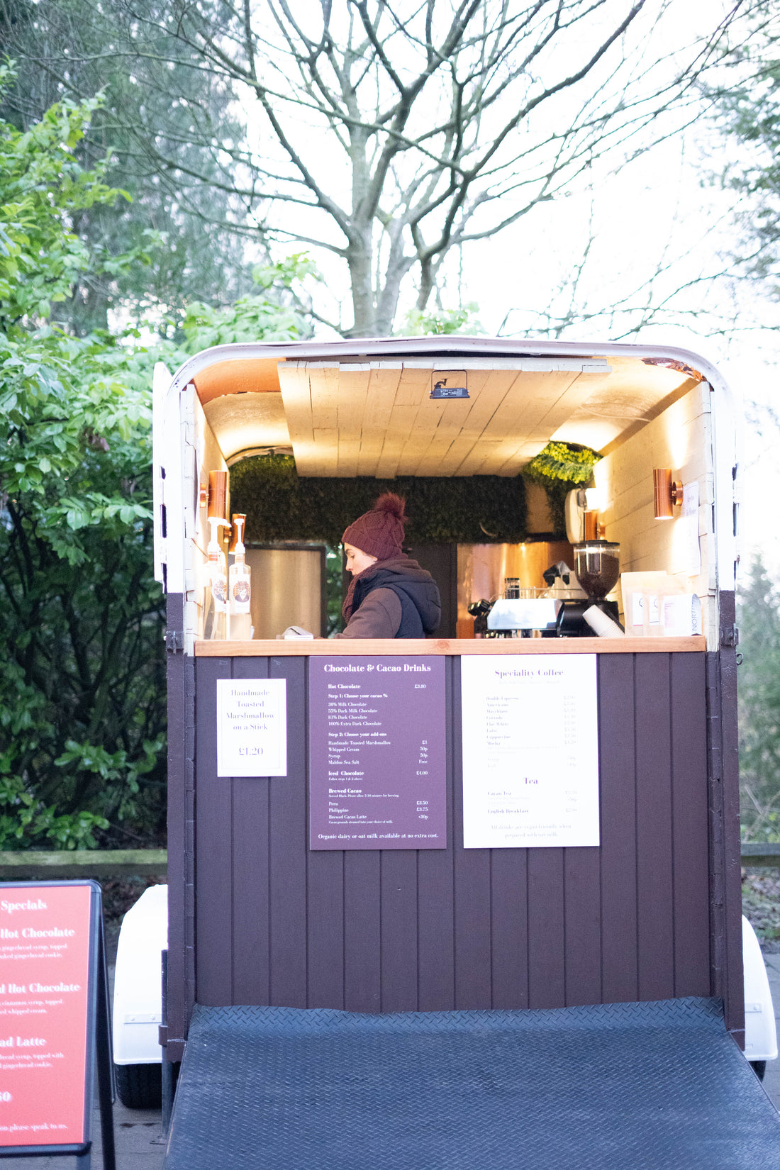 Cacao Brew drinks trailer open with cacao brew team making chocolate drinks