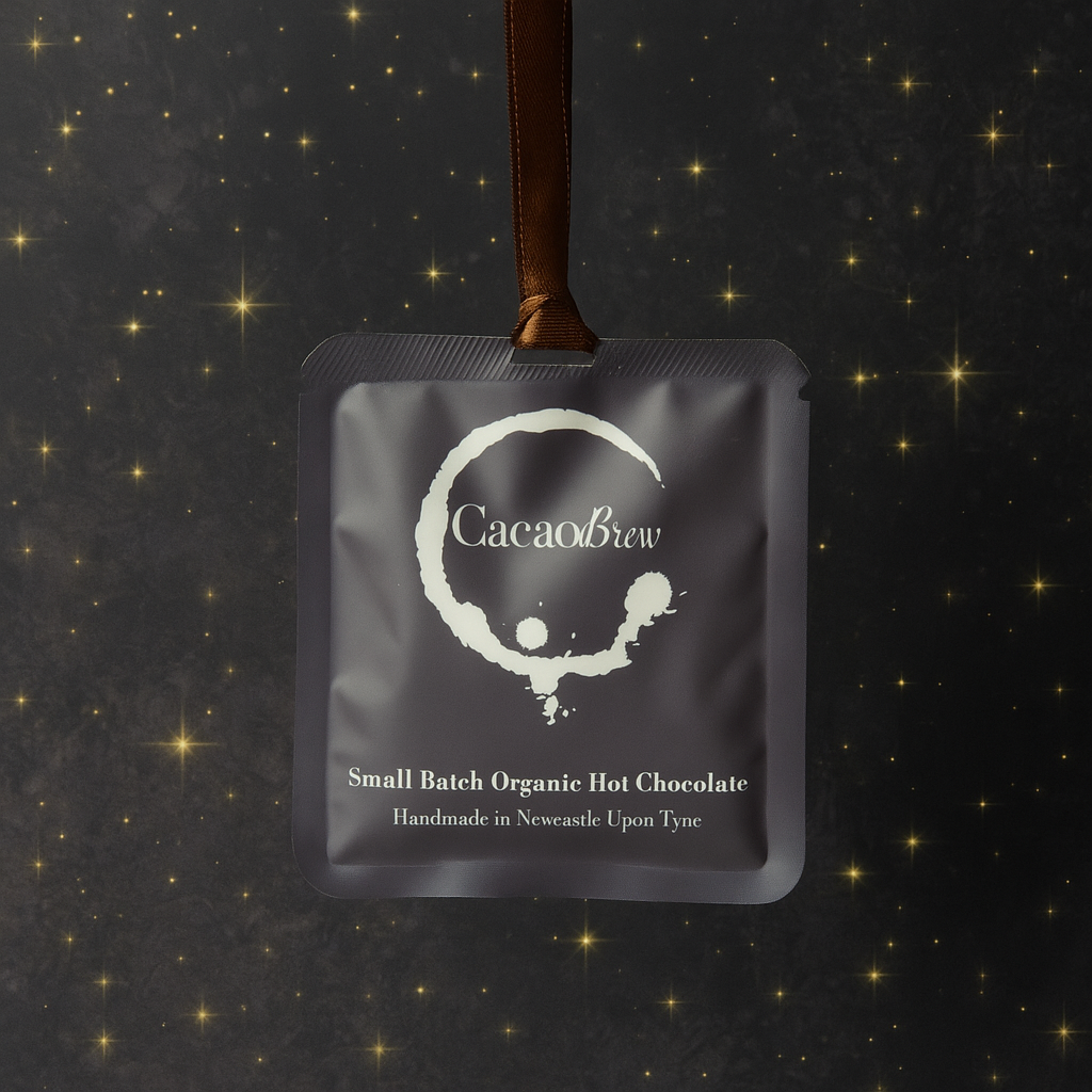 Organic Hot Chocolate sachet with ribbon, ready  for festive Christmas tree decoration.