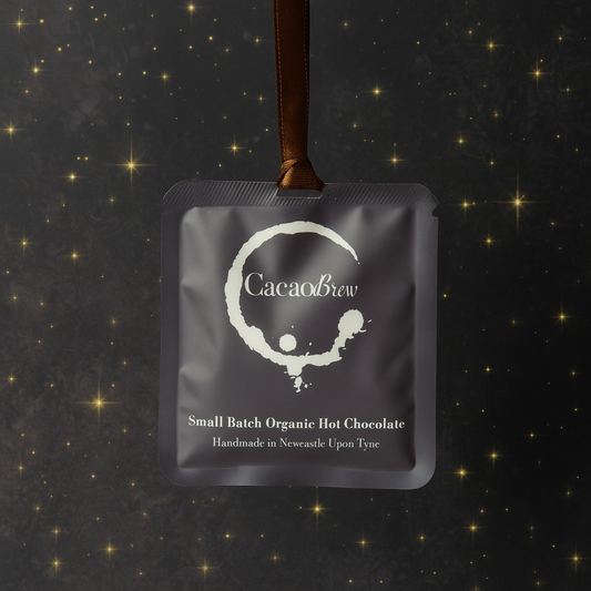 Organic Hot Chocolate sachet with ribbon, ready  for festive Christmas tree decoration.